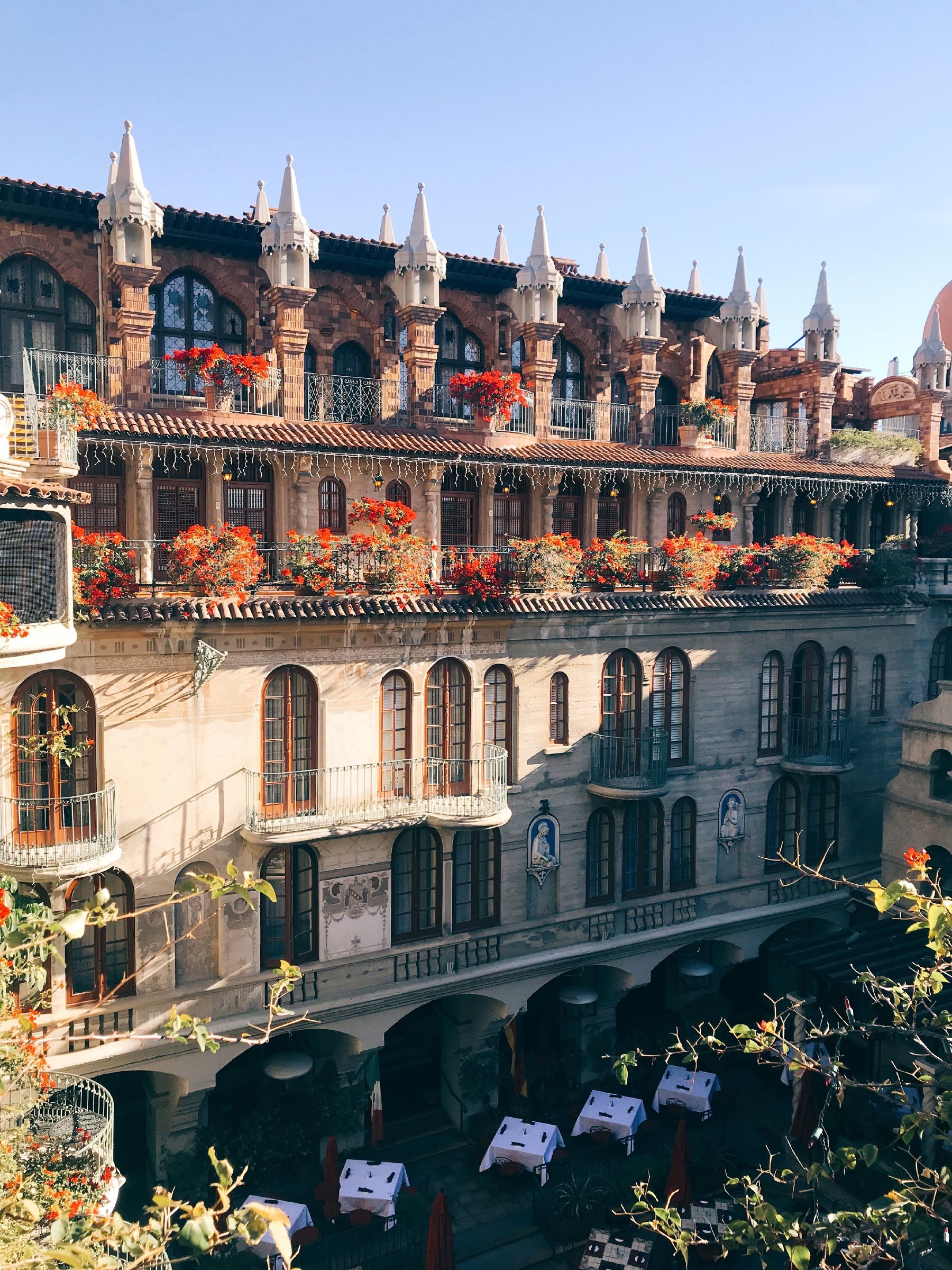 The Mission Inn Hotel & Spa looks like a Mediterranean oasis, lush with palm trees and bougainvillea-filled courtyards.